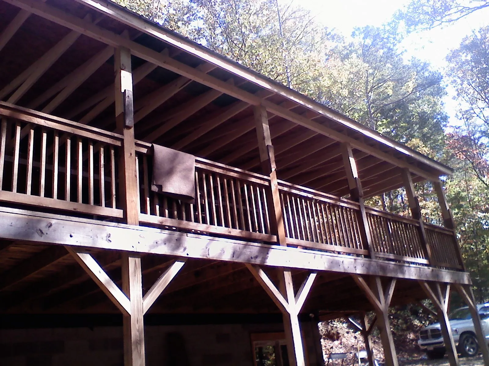 Timber framing under a new elevated porch and deck — Roof Leak Repair in Apison by Roofing Brothers